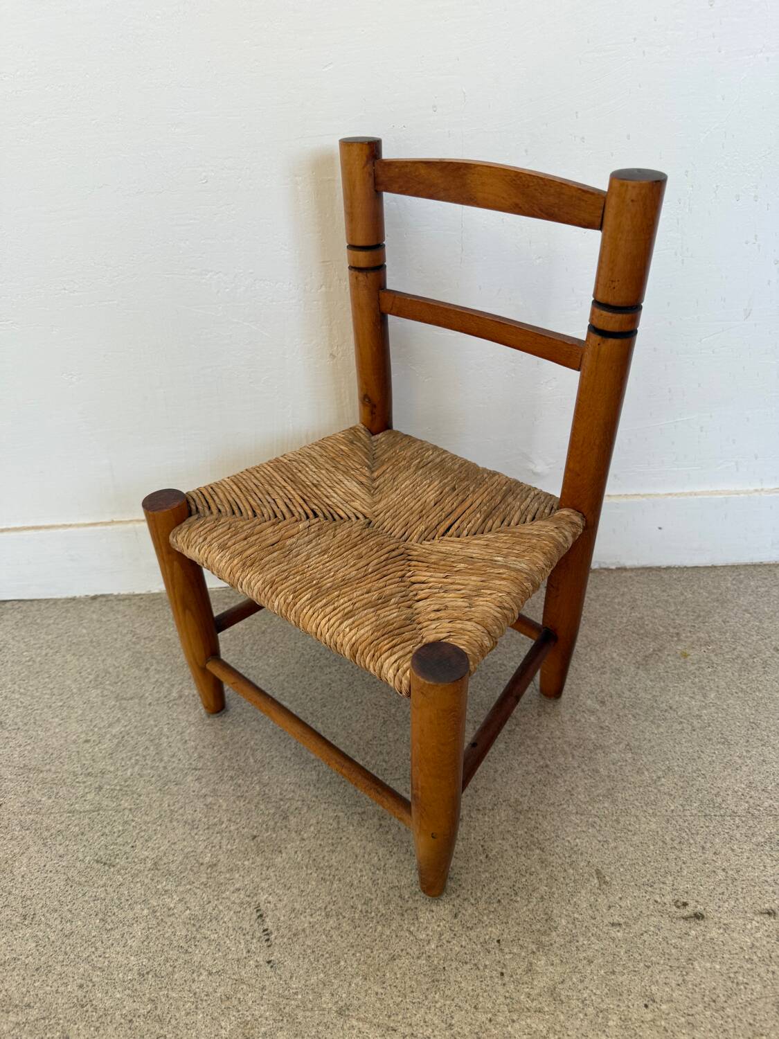 Vintage wooden and straw children's chair