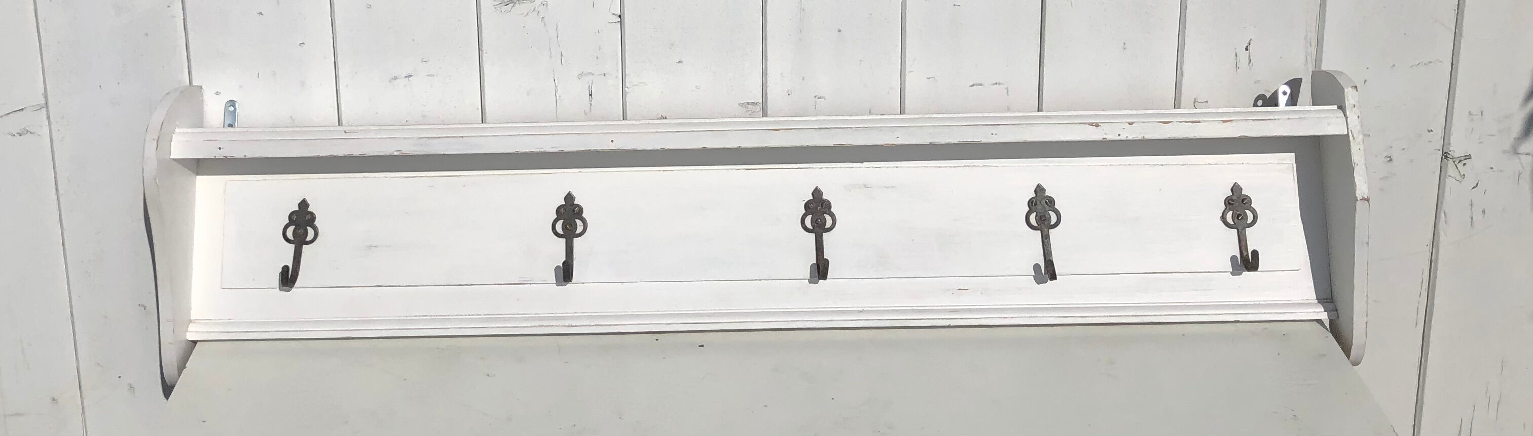 White wood wall coat rack