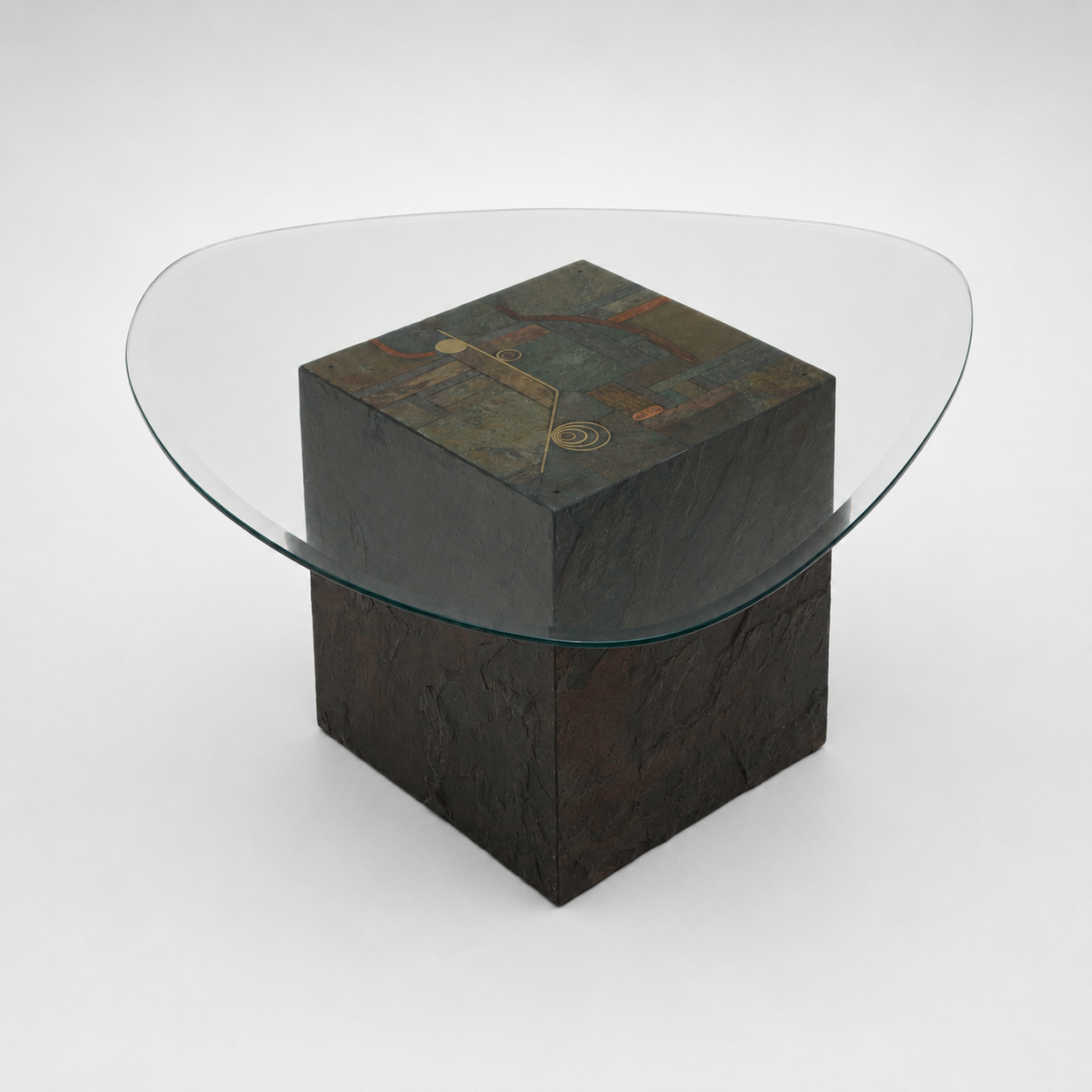 Unique design coffee table with natural stone base and organic glass top