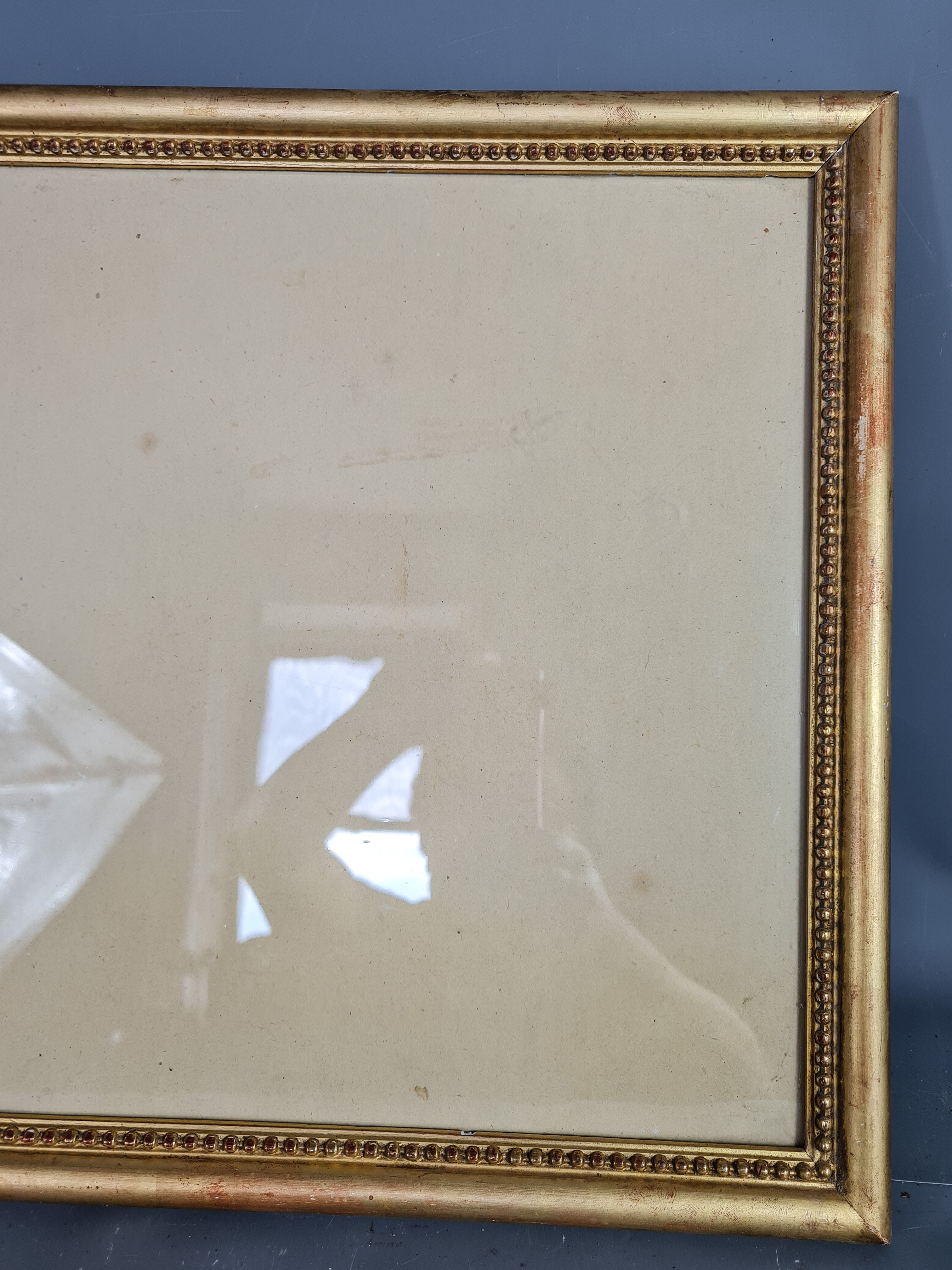 Old frame beaded decoration, gilded stucco wood