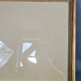 Old frame beaded decoration, gilded stucco wood