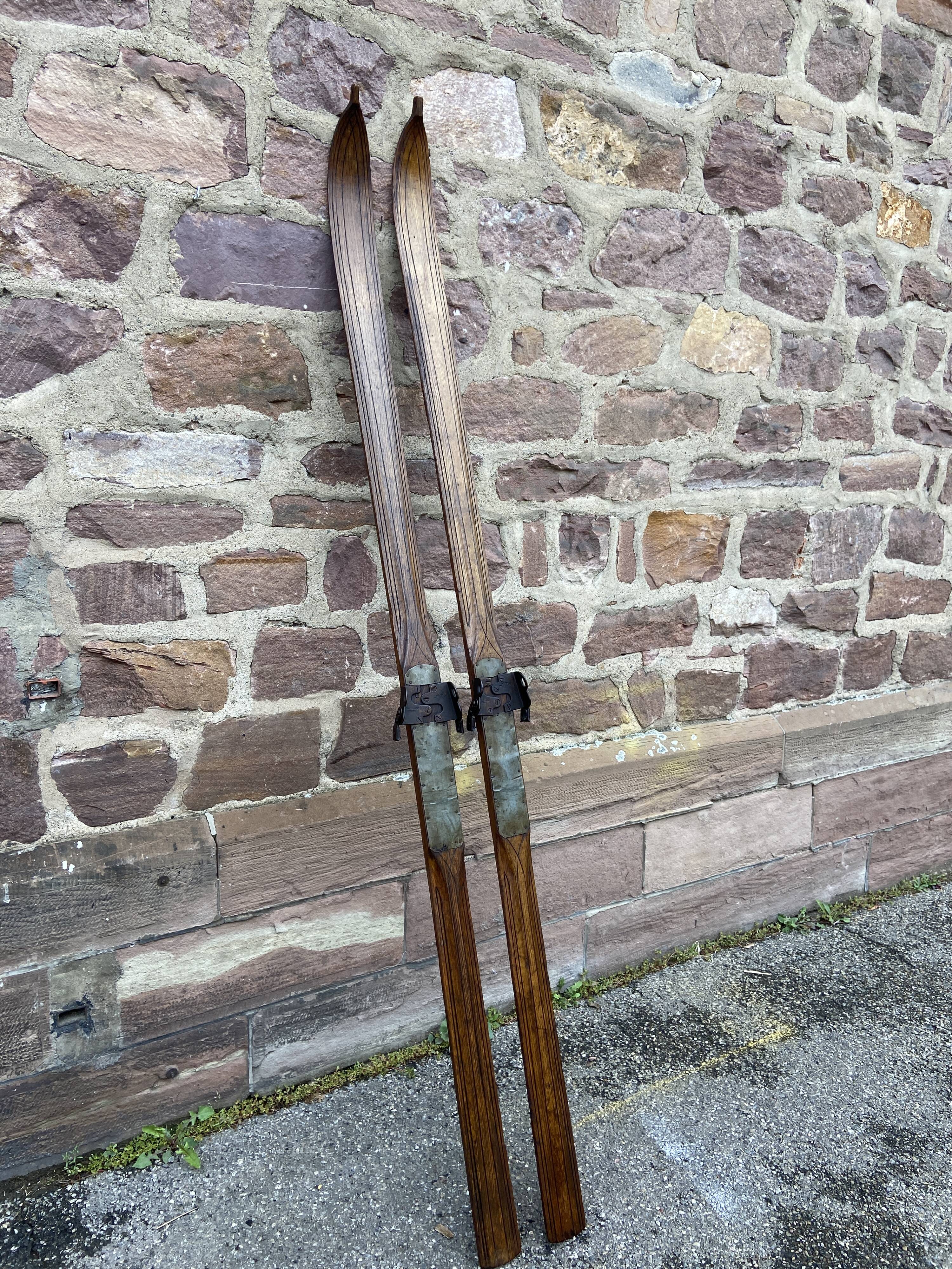 Pair of vintage wooden skis 1900-1920 mountain sport alsace chalet alps