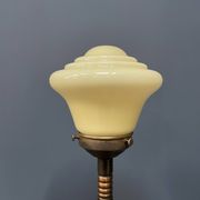 Standing copper table lamp with glass shade
