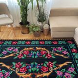 Vintage Romanian wool carpet floral design on black background 235x150cm
