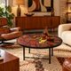 Vintage round coffee table in graphic red and yellow ceramic from the 1960s.
