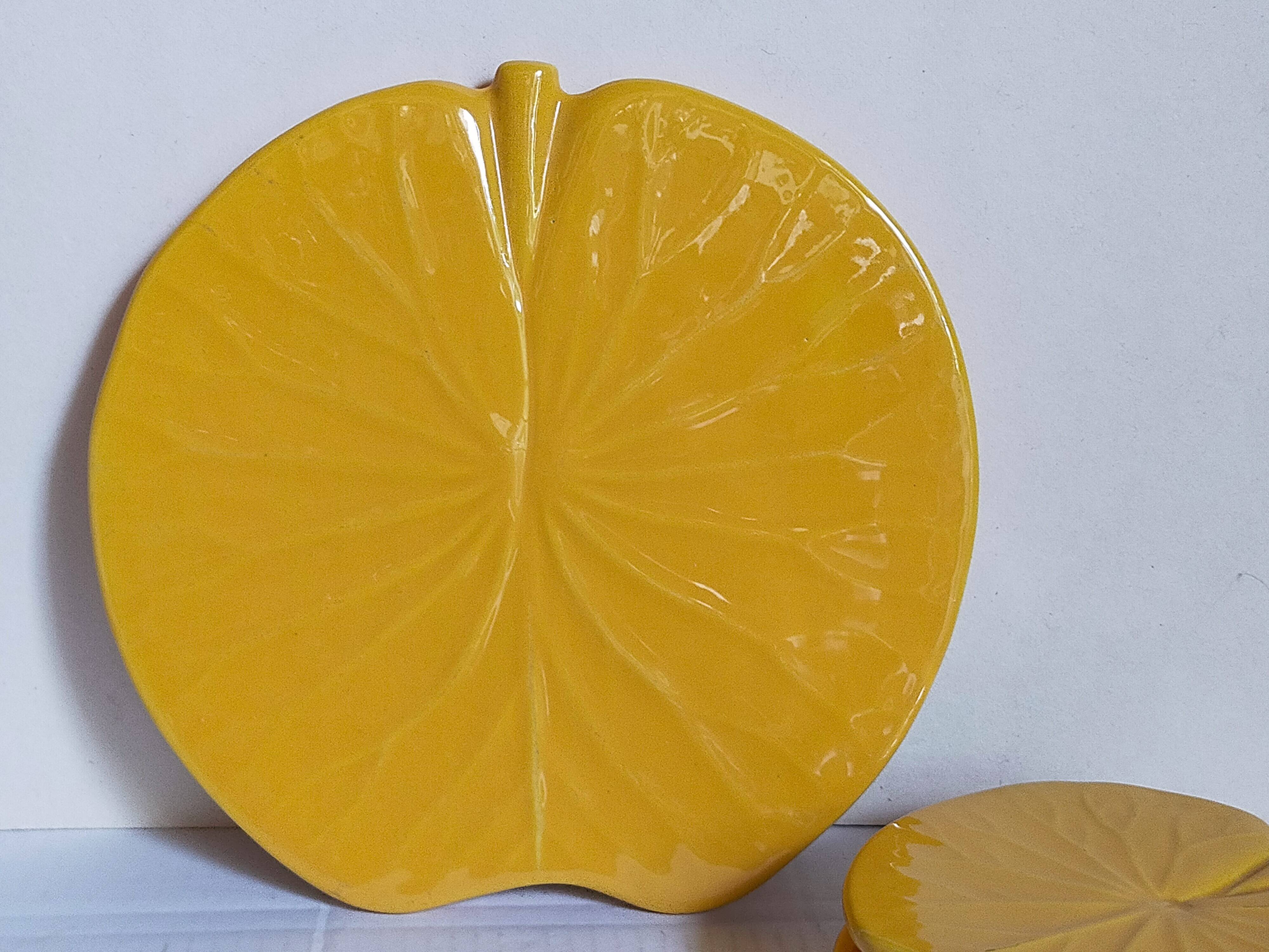 Three vintage water lily presentation dishes in slip