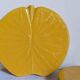 Three vintage water lily presentation dishes in slip