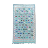 Faded blue Berber ethnic carpet
