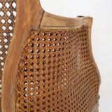 Louis XV style carved armchair with double sided cane work on the side panels
