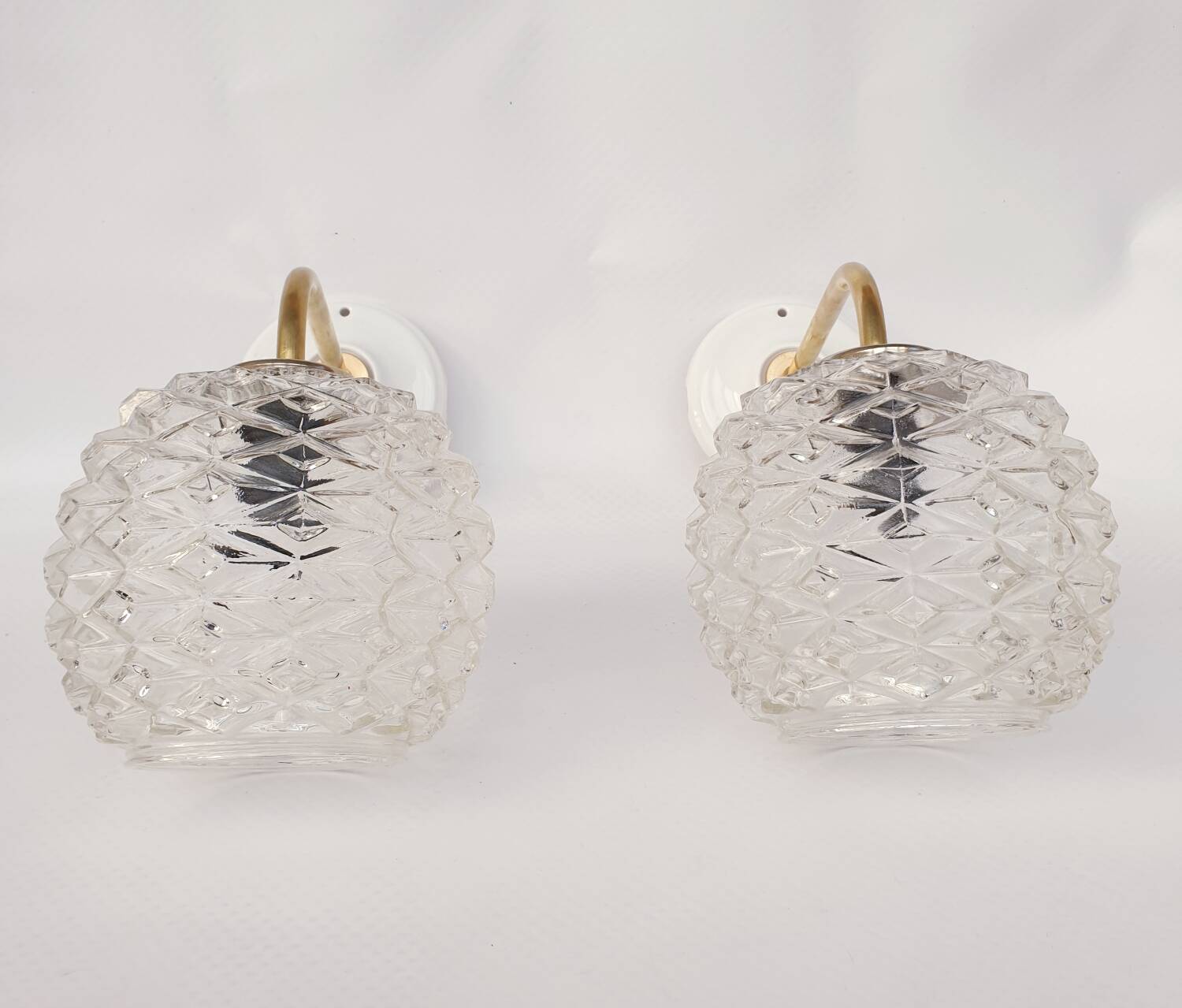 Swan neck and glass wall lights