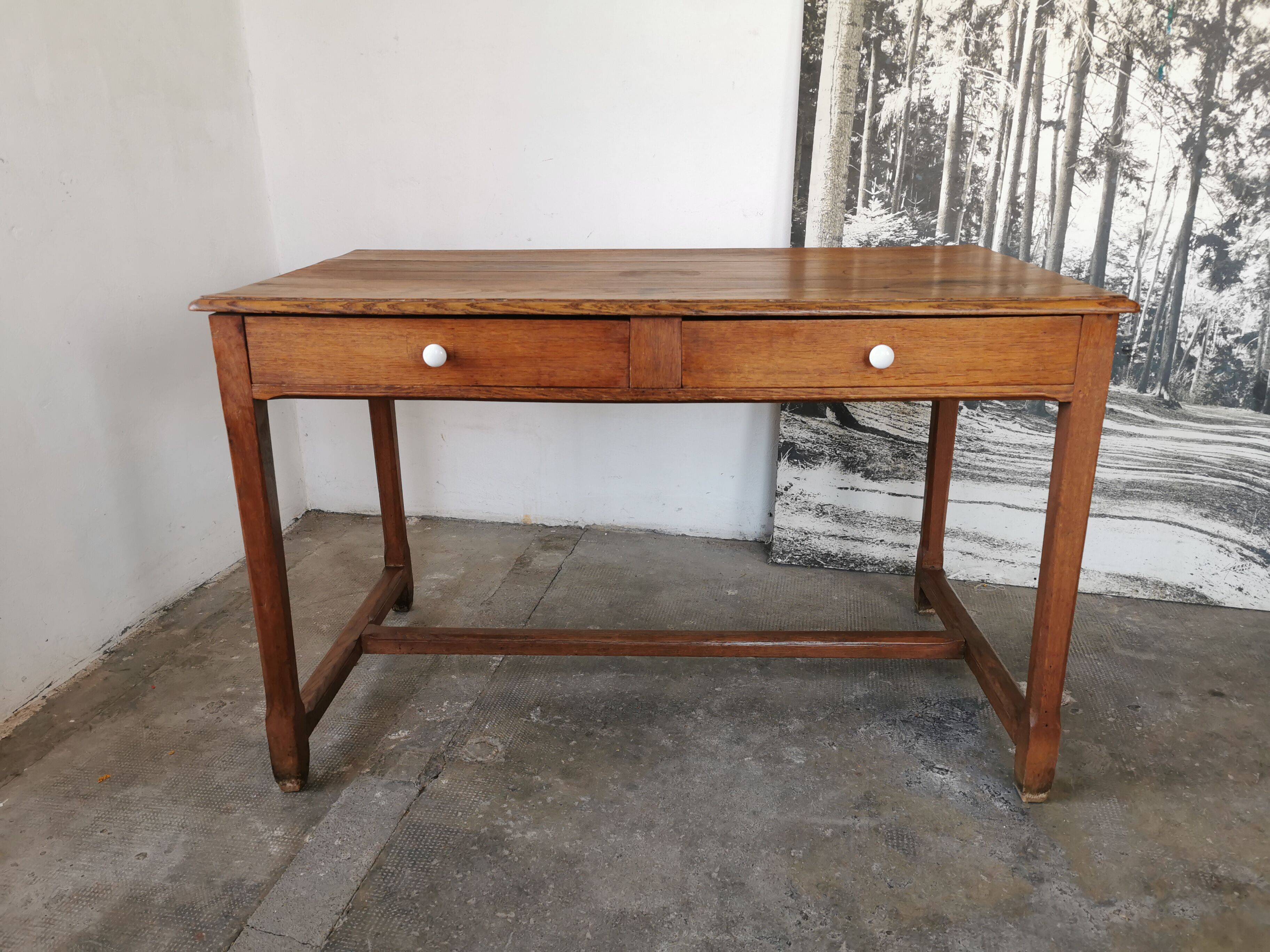 Table in raw oak, countryside.