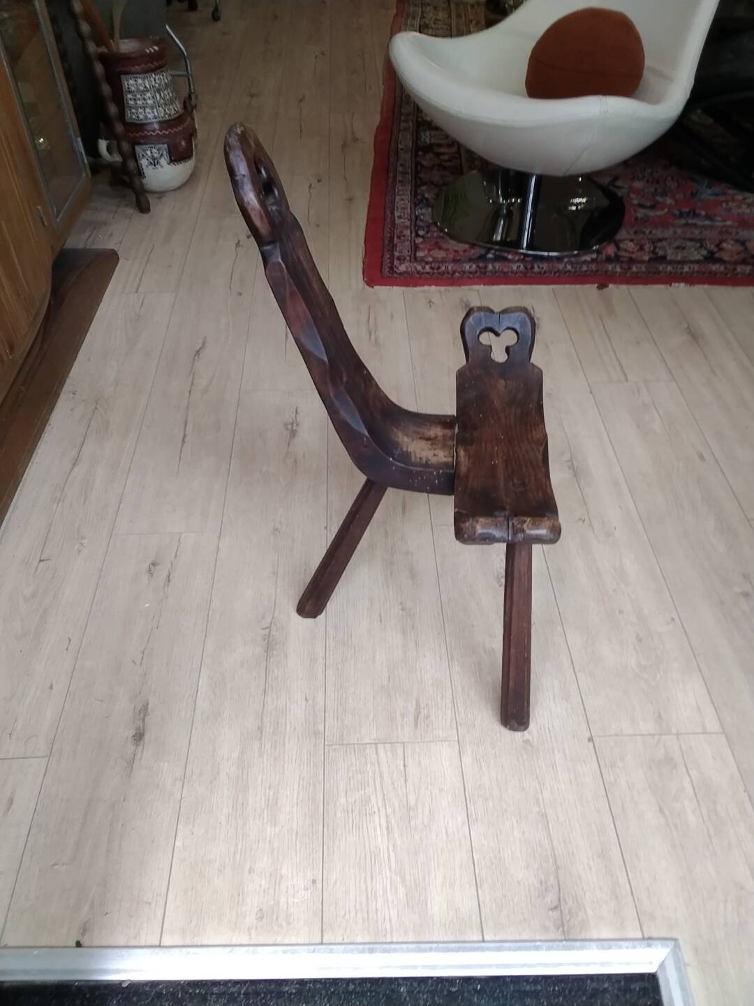 Rustic wooden tripod chair