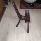 Rustic wooden tripod chair