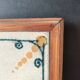 Vintage ceramic trivet – stylised floral design