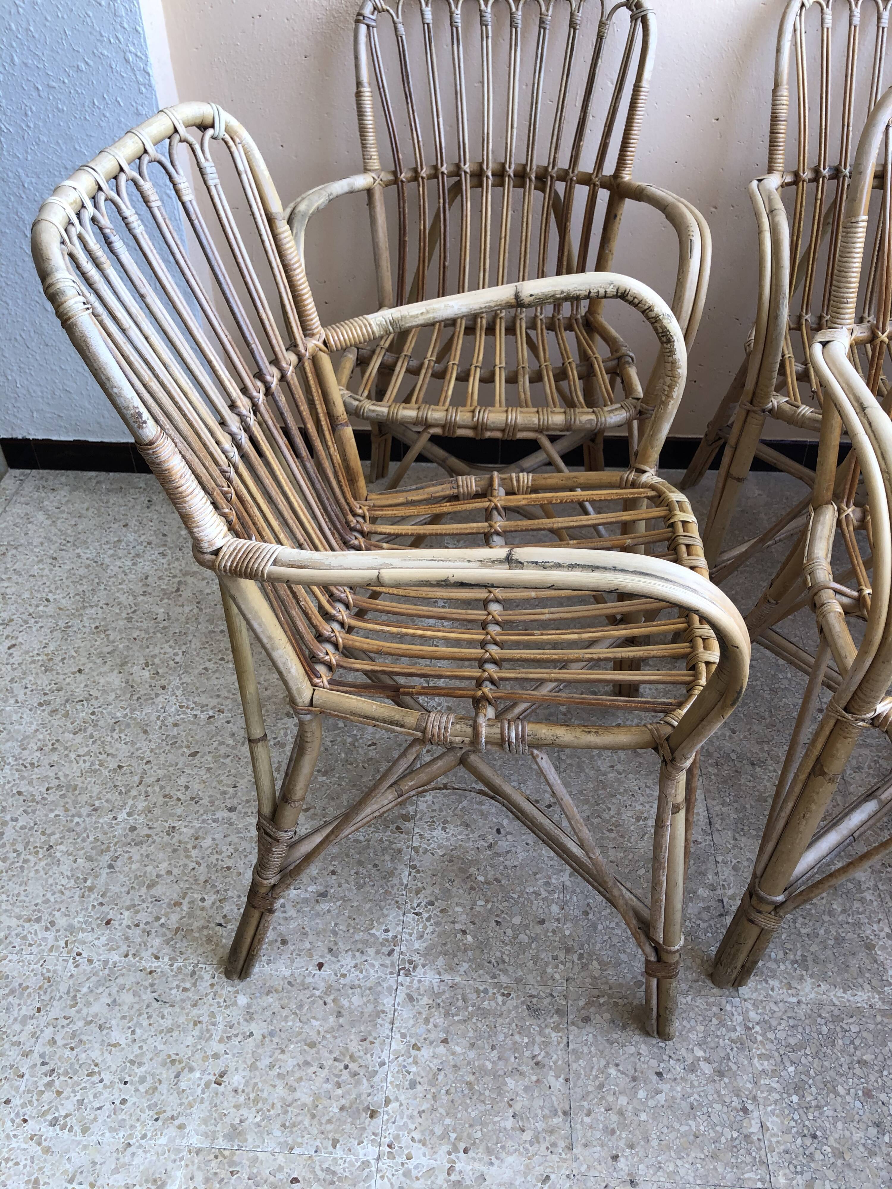 Series of 4 vintage rattan armchairs
