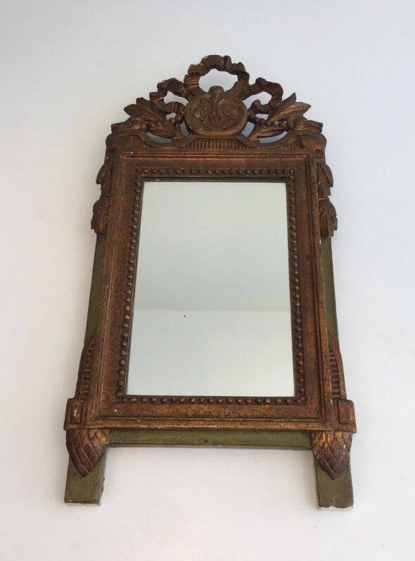 Louis XVI style mirror in patinated and gilded wood