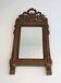 Louis XVI style mirror in patinated and gilded wood