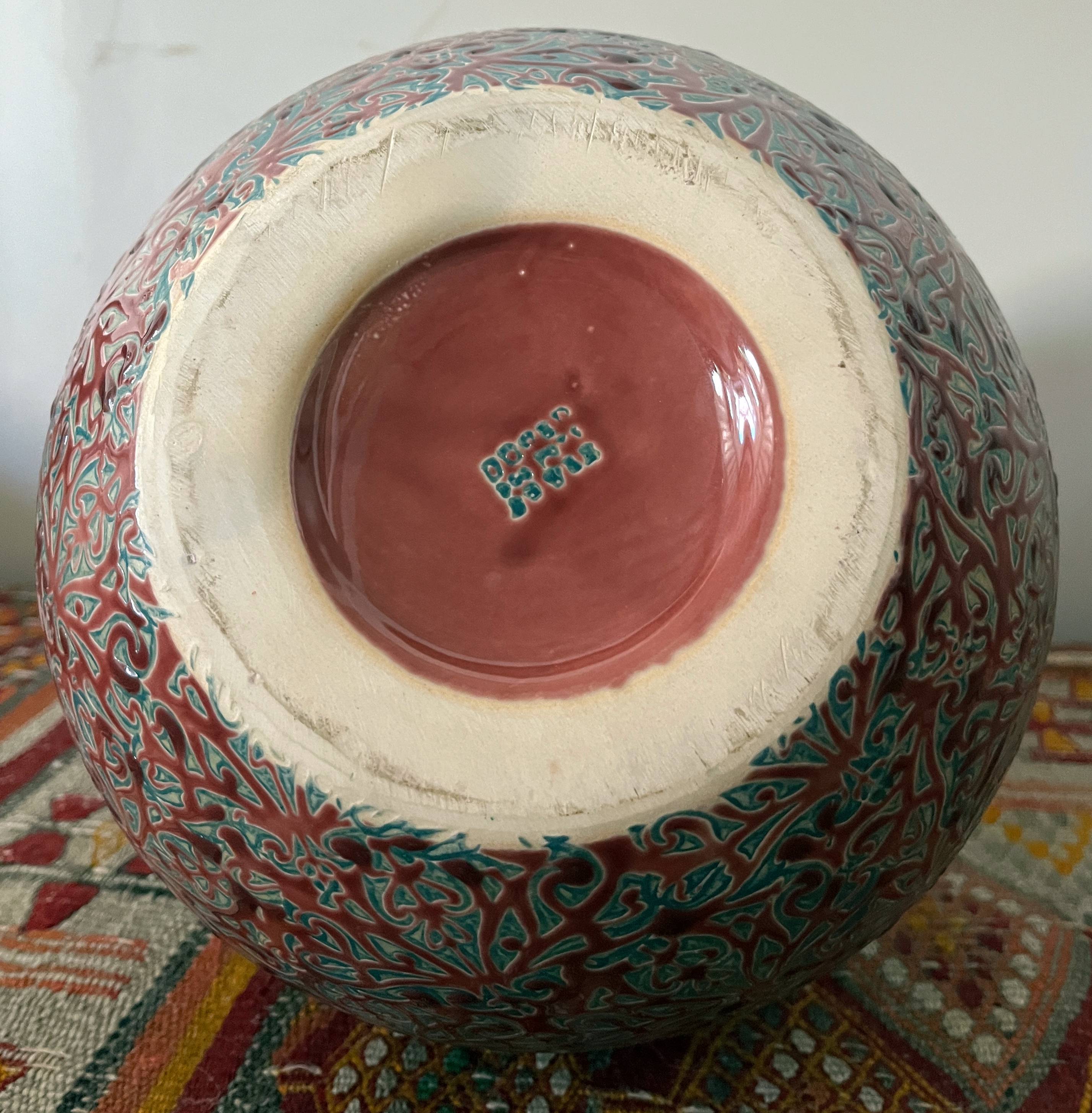 Large ceramic art vase with signed enamel interlacing