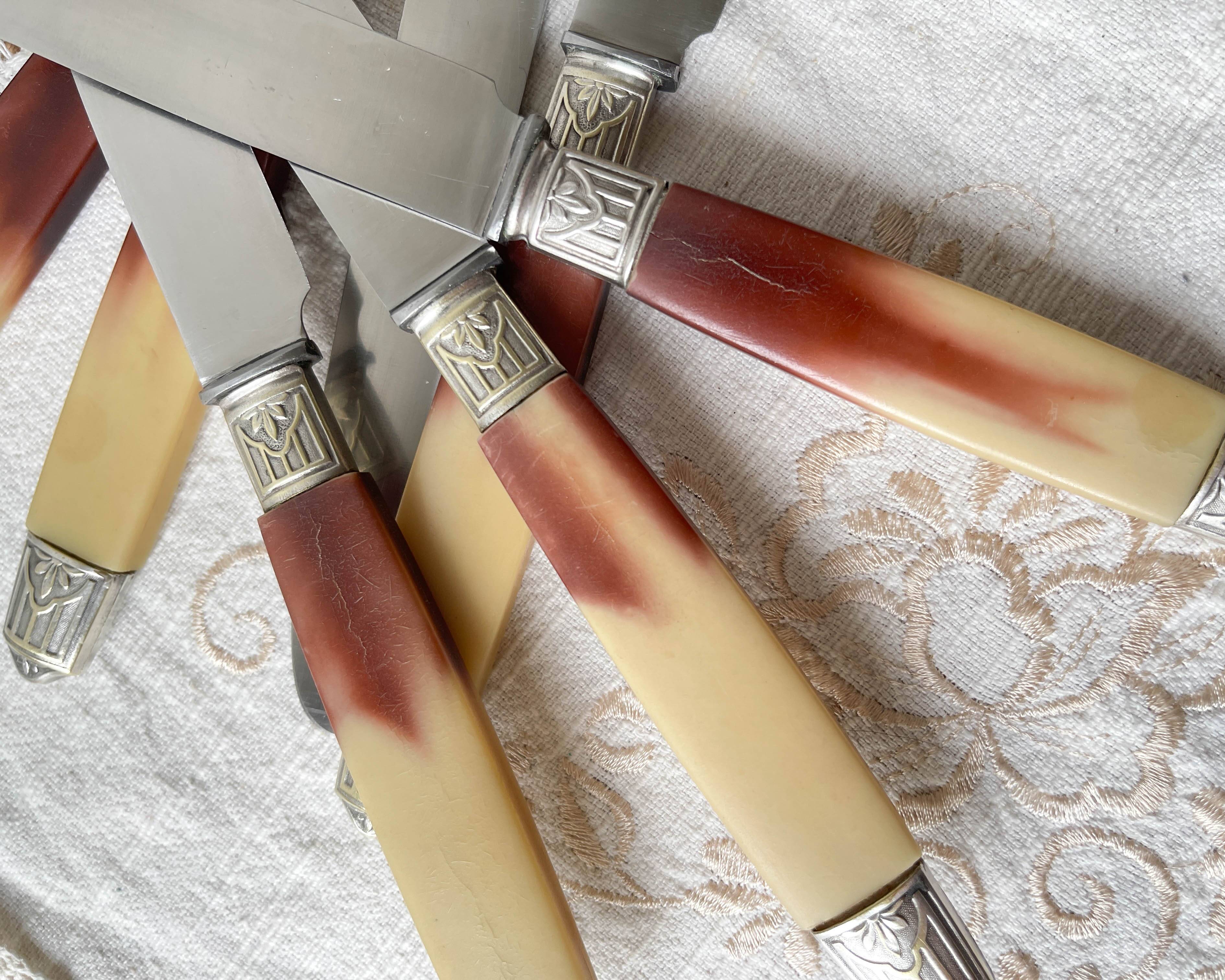 12 vintage Pradel stainless steel bakelite knives