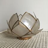 Candlestick or candle holder in nacre flower shape