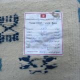 Nomadic Tunisian Berber rug, margoum kilim, ethnic in beige and blue wool.