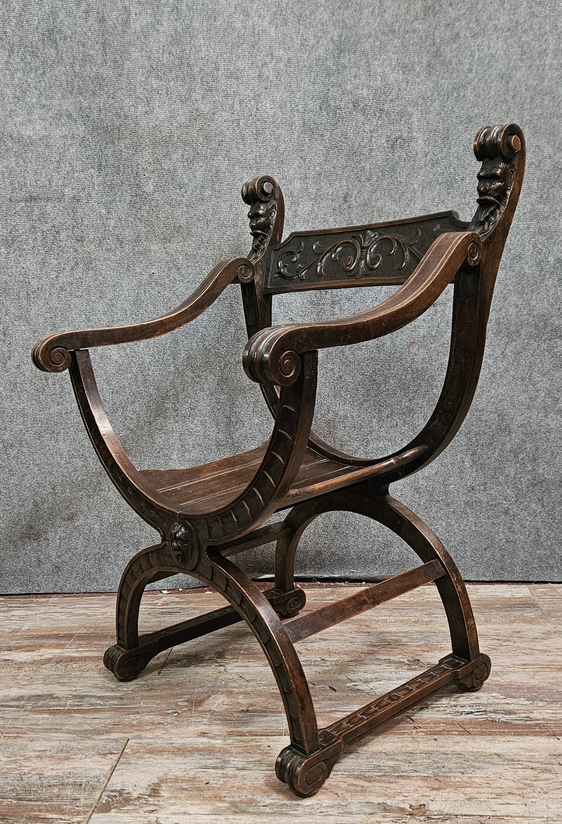 Antique curule chair in carved wood – Renaissance / Savonarole style