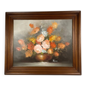 Vintage decorative table featuring a floral still life, signed Frederik.