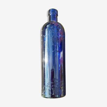 Vintage decorated glass bottle