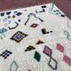 Tapis berbère Beni Ouarain 300x200 cm – Laine écrue motifs symboliques