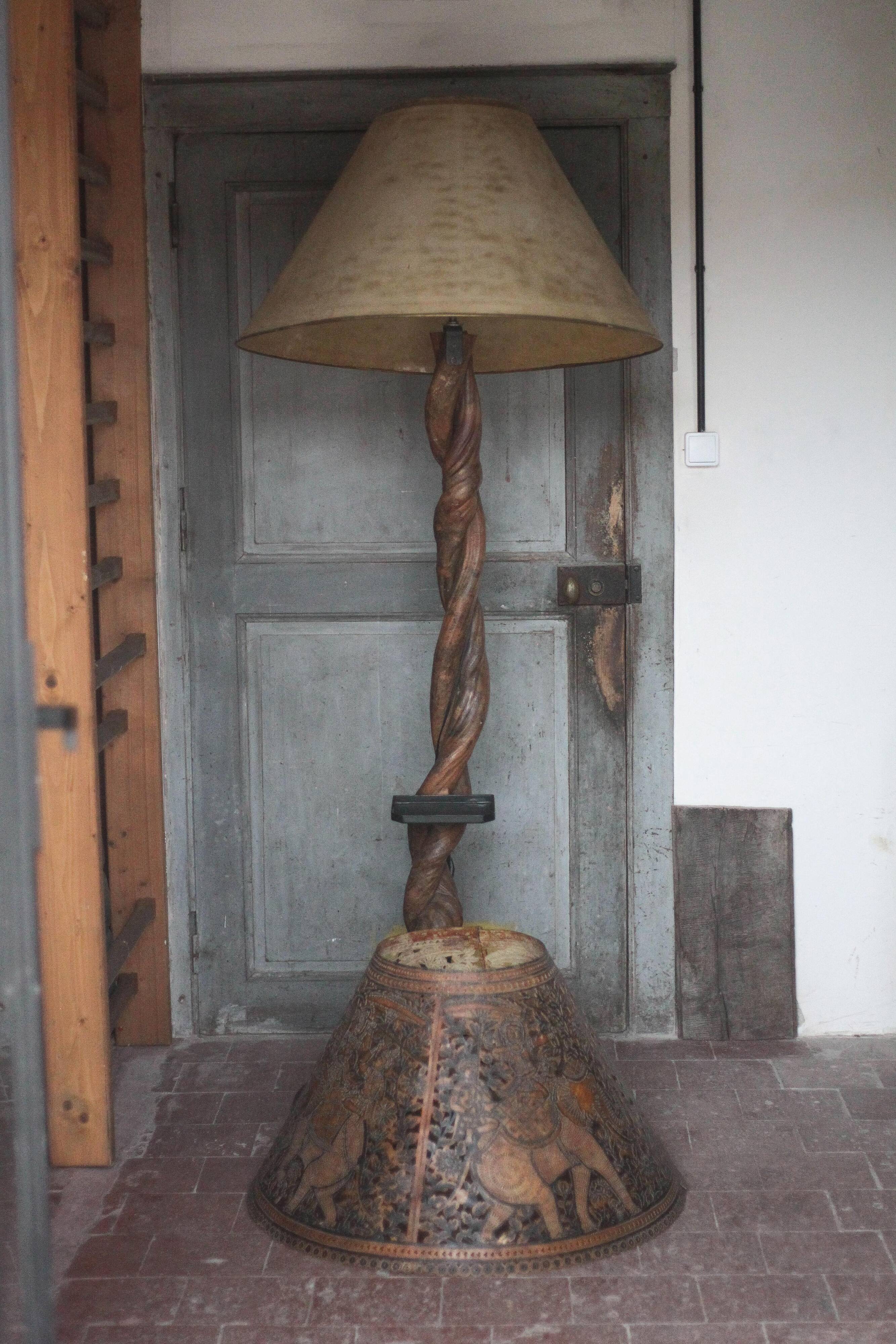 Liane and metal floor lamp with perforated leather shade featuring elephant patterns, lise.