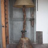 Liane and metal floor lamp with perforated leather shade featuring elephant patterns, lise.