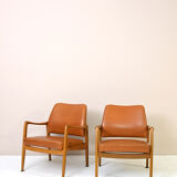 Pair of vintage Danish teak and leather armchairs