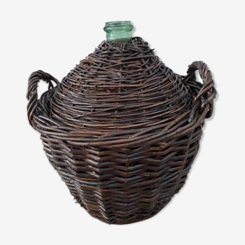 Demijohn in its wicker case