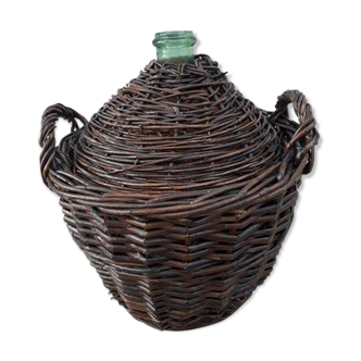 Demijohn in its wicker case