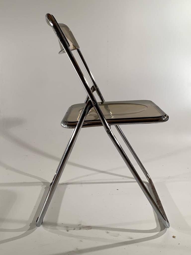 stainless steel and smoked plastic folding chair 70s style