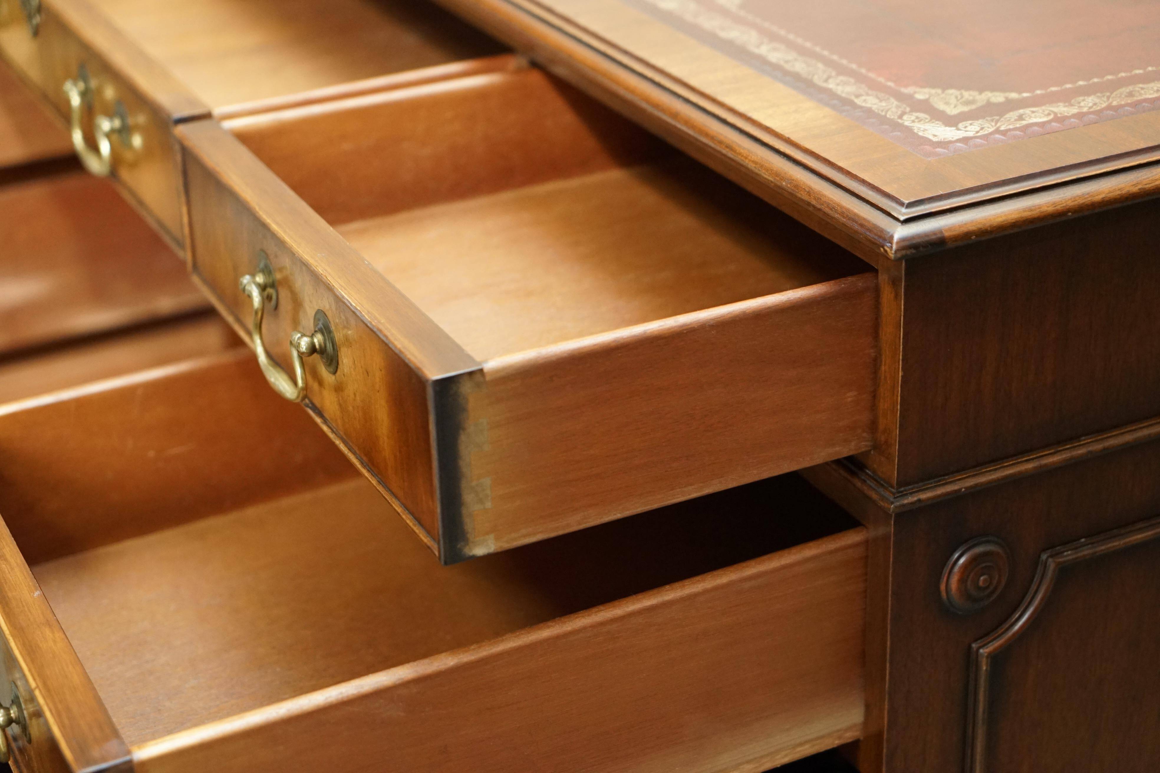 Partner desk Bevan Funnell in hardwood with leather top and gold leaf gilding.