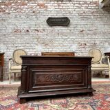 Chest in carved natural wood of the eighteenth century