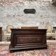 Chest in carved natural wood of the eighteenth century