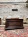 Chest in carved natural wood of the eighteenth century