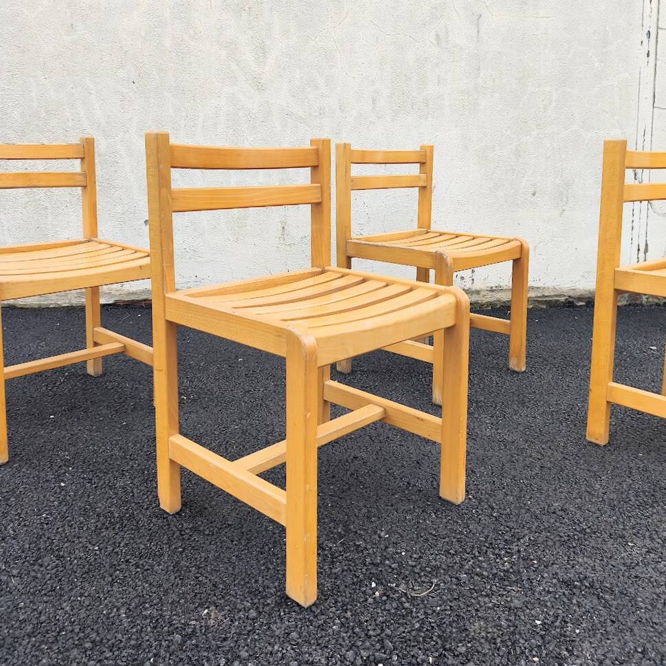 Set of 4 varnished wooden chairs, André Sornay