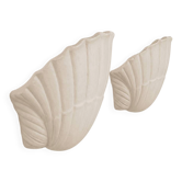Pair of matte white plaster shell wall lights, France, 1970.