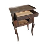 Curtained bedside table