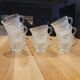 8 tasses en verre épais ciselé