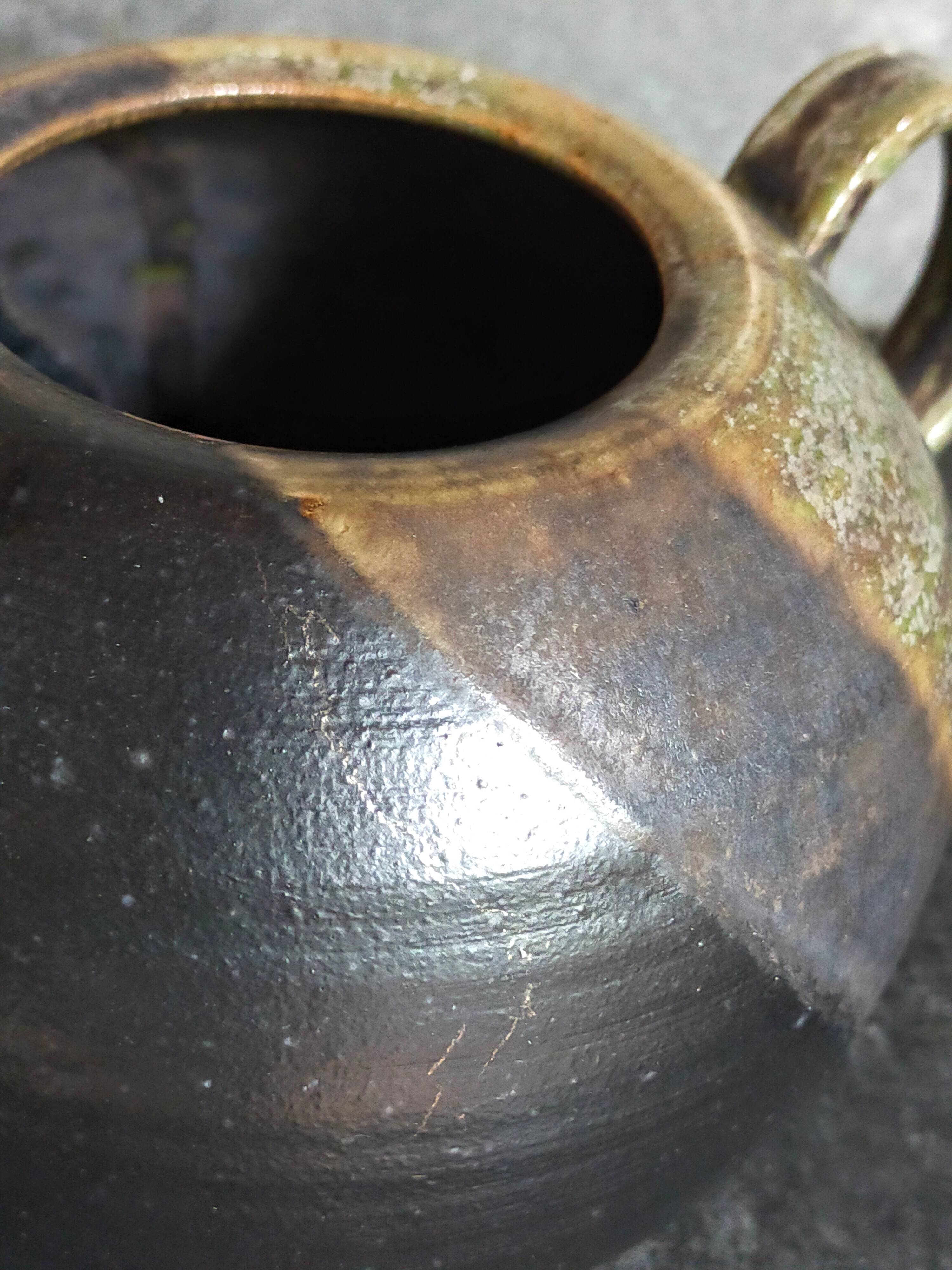 Vintage enameled stoneware potter's teapot