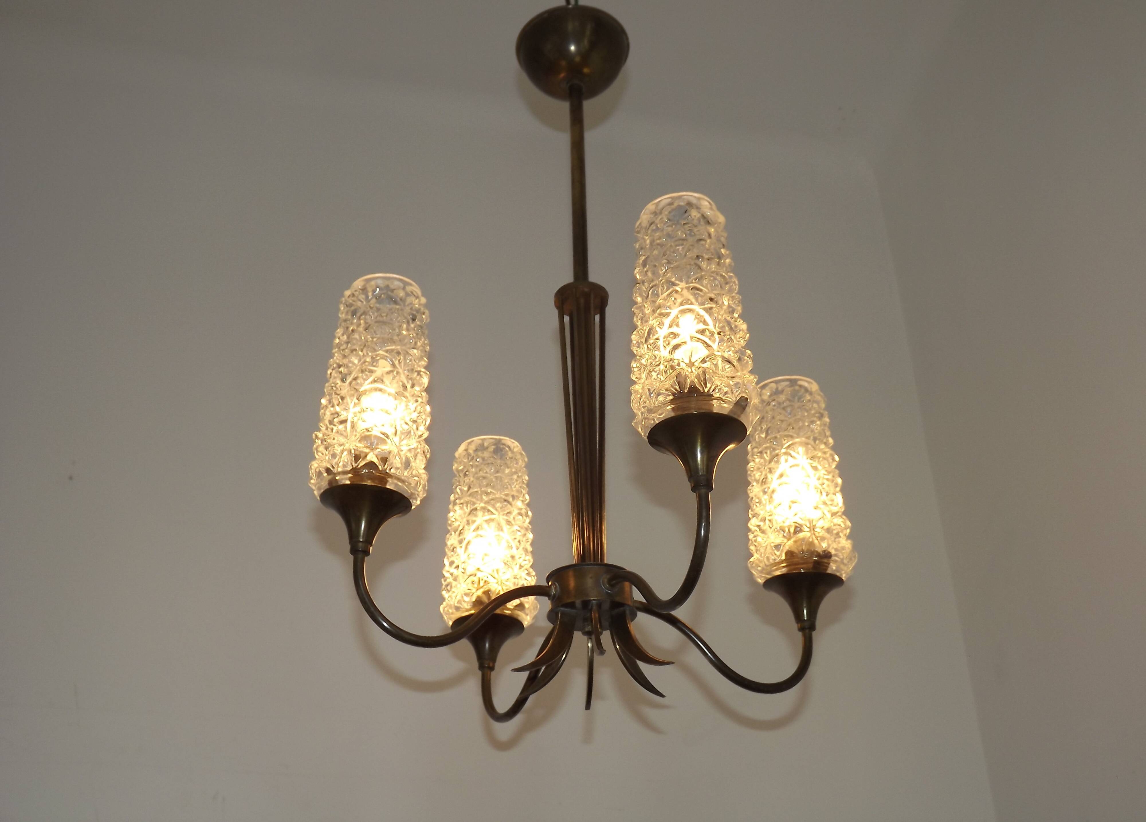 French vintage retro chandelier with 4 lights in brass and bronze with cut glass shades.