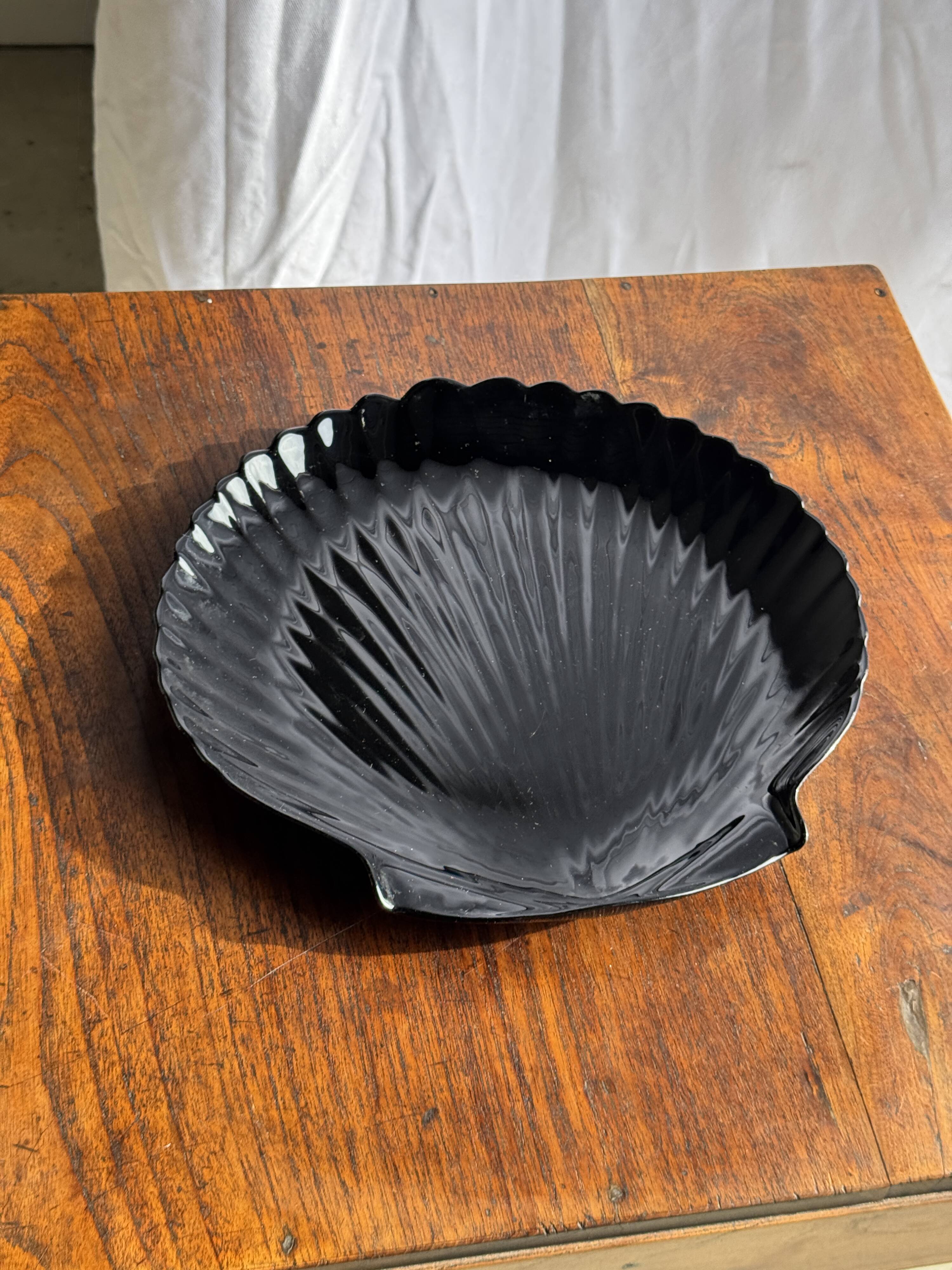 Pair of vintage black glass shell dishes D32 and D26