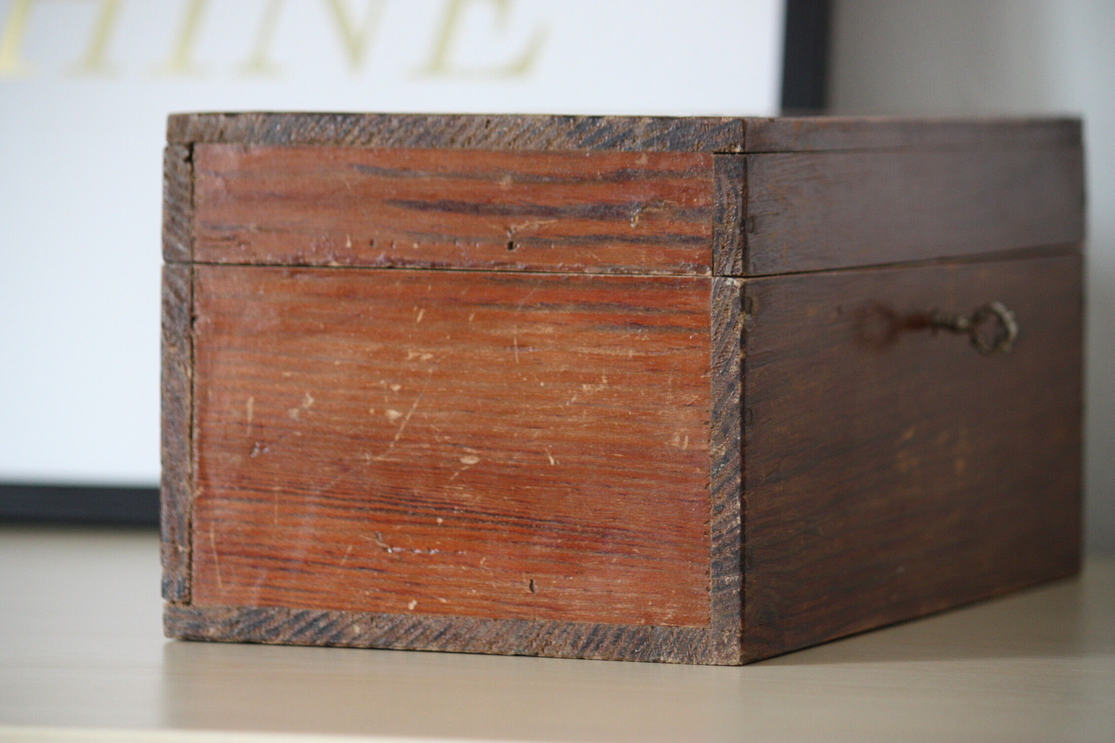 Carved wooden box with lock
