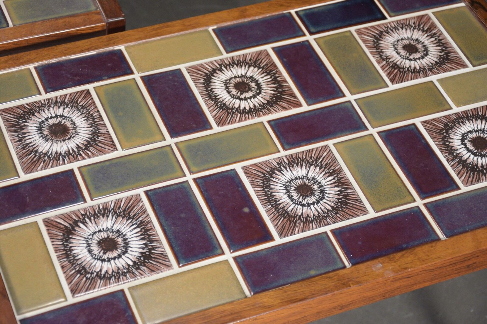 Pair of rosewood lamp tables, inlaid with coloured tiles