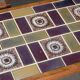 Pair of rosewood lamp tables, inlaid with coloured tiles