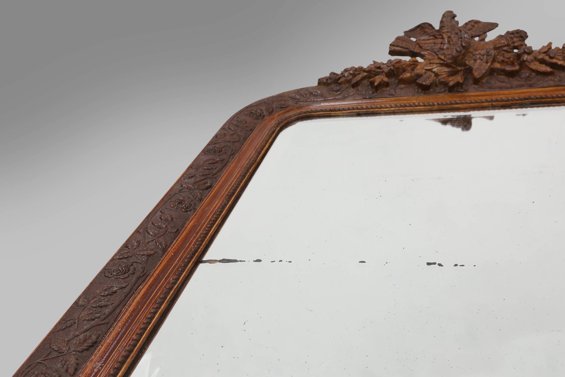 Louis Philippe mirror in plaster and wood with handcrafted decorations, France ca. 1900